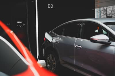 Audi's Innovative Quick Charging Hub: Chill In A Swanky Lounge Or Test Drive an E-Tron