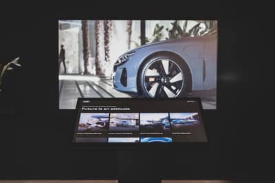 Audi's Innovative Quick Charging Hub: Chill In A Swanky Lounge Or Test Drive an E-Tron
