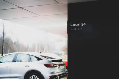 Audi's Innovative Quick Charging Hub: Chill In A Swanky Lounge Or Test Drive an E-Tron