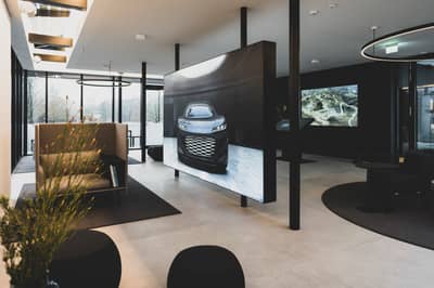 Audi's Innovative Quick Charging Hub: Chill In A Swanky Lounge Or Test Drive an E-Tron