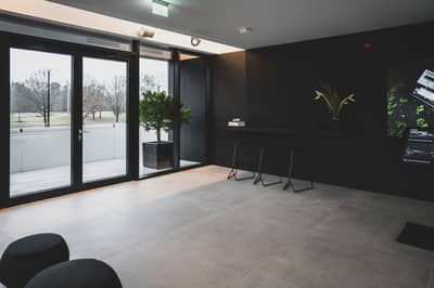 Audi's Innovative Quick Charging Hub: Chill In A Swanky Lounge Or Test Drive an E-Tron
