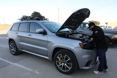 How Do You Make the World's Fastest Christmas Tree? Strap It on Top of a Hennessey-Tuned Jeep!