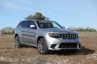 How Do You Make the World's Fastest Christmas Tree? Strap It on Top of a Hennessey-Tuned Jeep!
