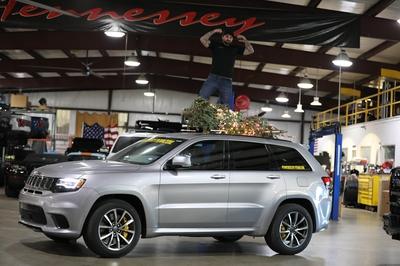 How Do You Make the World's Fastest Christmas Tree? Strap It on Top of a Hennessey-Tuned Jeep!